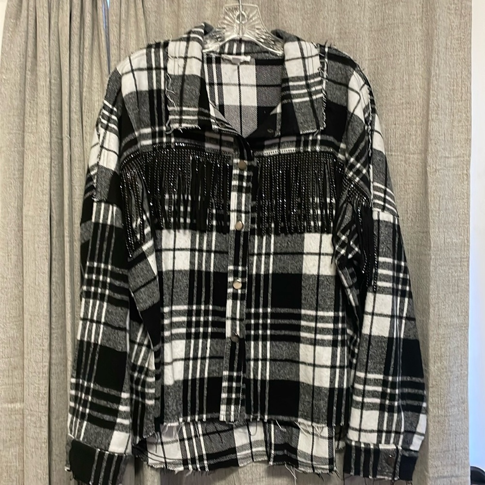 Black/White plaid flannel shacket with sparkle trim.